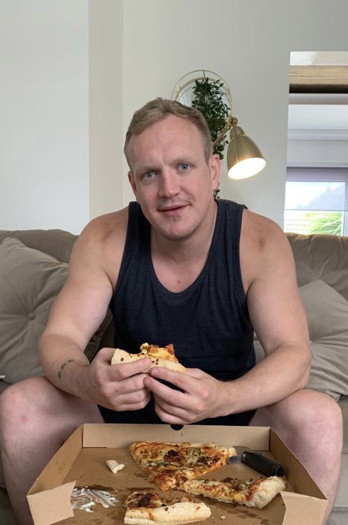 Barry O’Shea enjoying pizza at home